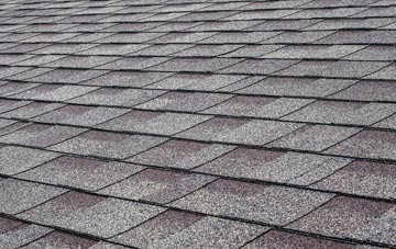 Pillwell tiles for shallow pitch roofing